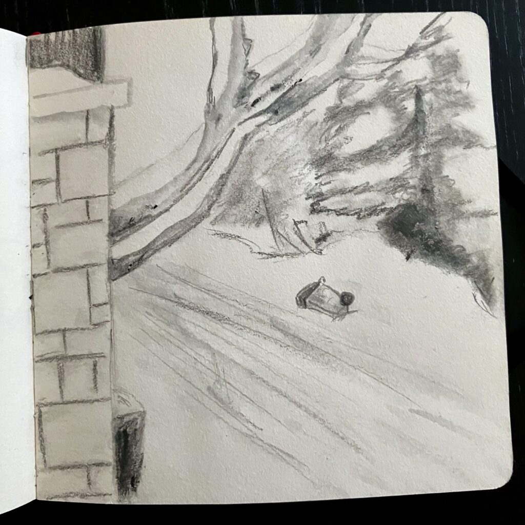 A graphite drawing of a snowy street.